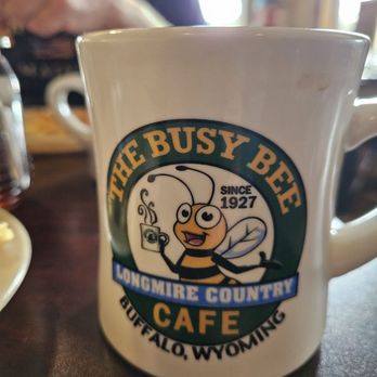 The Busy Bee Cafe - a coffee cup with a bee on it - Cafes Near Me - Buffalo, Wyoming