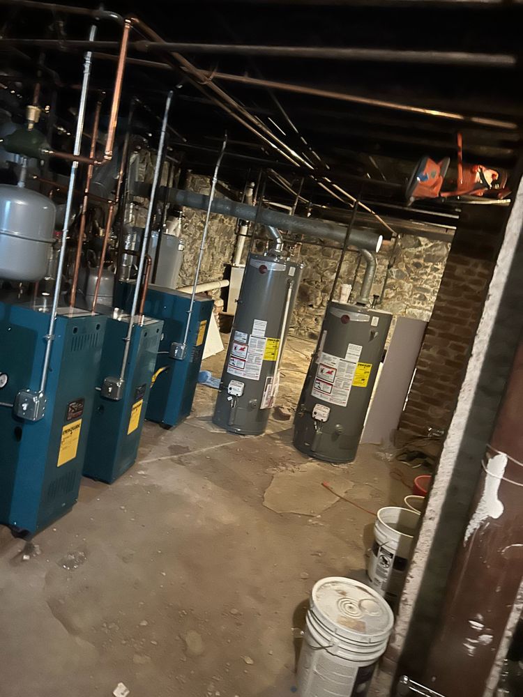 Slide of RJ Spag Plumbing&Heating