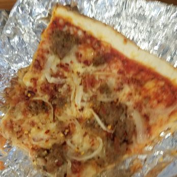 East Side Pies - Slice of sausage, bacon, onion. - Pizza Near Me - Austin, Texas