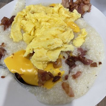 @ The Diner - Loaded grits with bacon American cheese and scrambled eggs, my only wish was that they had shredded cheese. - Breakfast & Brunch Near Me - Orlando, Florida @ The Diner - Loaded grits with bacon American cheese and scrambled eggs, my only wish was that they had shredded cheese. - Breakfast & Brunch Near Me - Orlando, Florida