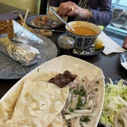 Lahmacun, chicken doner, Adana kebab lentil soup, salad Lahmacun, chicken doner, Adana kebab lentil soup, salad