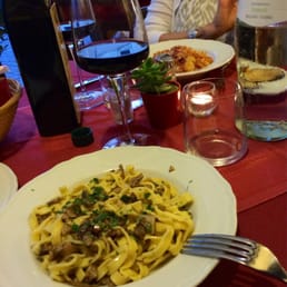 Homemade tagliatelle with porcini mushrooms, house red wine