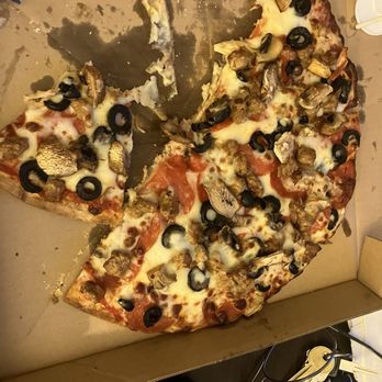 Jet City Pizza - Pepperoni, sausage, mushroom, and black olive in better lighting - Pizza Near Me - Bothell, Washington Jet City Pizza - Pepperoni, sausage, mushroom, and black olive in better lighting - Pizza Near Me - Bothell, Washington