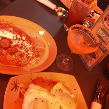 Snooze, an A.M. Eatery - Cinnamon Toast Pancake, Spuds Deluxe. In back, spicy Bloody Mary & pancake flight - Breakfast & Brunch Near Me - Tustin, California Snooze, an A.M. Eatery - Cinnamon Toast Pancake, Spuds Deluxe. In back, spicy Bloody Mary & pancake flight - Breakfast & Brunch Near Me - Tustin, California