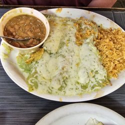 Julio's Mexican Restaurant - Enchilada Verdes and Charo beans. Excellent Charo beans, plenty of sauce and cheese on Enchiladas.