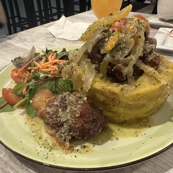 Las Casitas Latin Restaurant - Mofongo relleno de cerdo al ajillo - Puerto Rican Near Me - Orlando, Florida Las Casitas Latin Restaurant - Mofongo relleno de cerdo al ajillo - Puerto Rican Near Me - Orlando, Florida