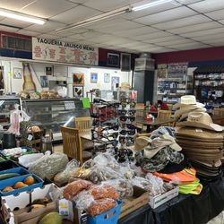 Taqueria Y Tienda Jalisco - Inside with seating amongst the produce and items for sale