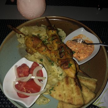 Ammos - Chicken skewers with chips, pita, and a spicy dipping sauce. - Greek Near Me - Luzern, LU