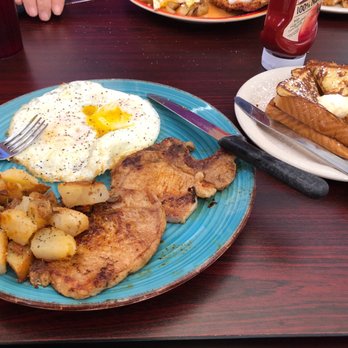 Country Scrambled Cafe 2 - Sorry I stabbed the egg before I took the picture. Pork chops and eggs with French toast. - Cafes Near Me - Humble, Texas Country Scrambled Cafe 2 - Sorry I stabbed the egg before I took the picture. Pork chops and eggs with French toast. - Cafes Near Me - Humble, Texas