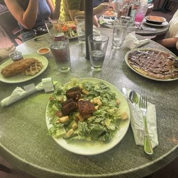 Blackened Salmon Caesar Salad chicken and waffles  Cinnamon Roll Pancake