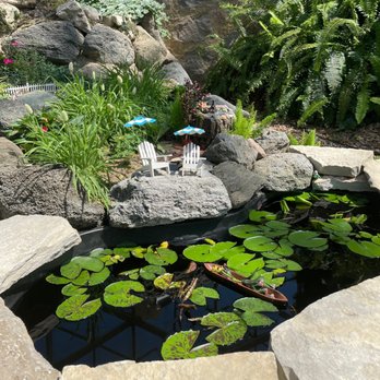 Mitchell Park Domes - Show room: lily pads with mini garden chairs teehee - Parks Near Me - Milwaukee, Wisconsin