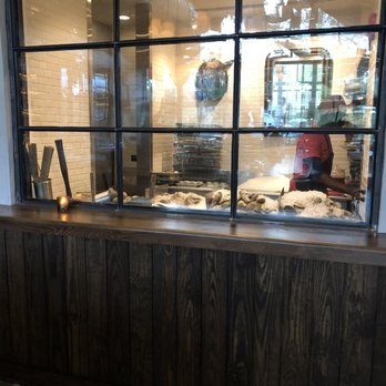 La Lucha - Exposed oyster shucking room. - Seafood Near Me - Houston, Texas La Lucha - Exposed oyster shucking room. - Seafood Near Me - Houston, Texas