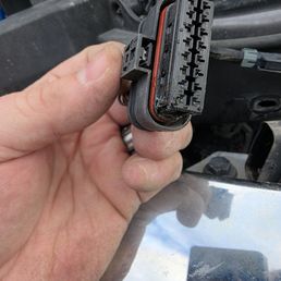 The corrosion in the harness connection.