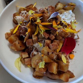Maketto - Apple pie sundae -- It had bits of apple pie crust and was topped with apple chunks, caramel and flowers. - Cafes Near Me - Washington, DC, District of Columbia Maketto - Apple pie sundae -- It had bits of apple pie crust and was topped with apple chunks, caramel and flowers. - Cafes Near Me - Washington, DC, District of Columbia
