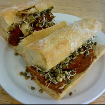 Rocket Bakery and Fresh Food - Chorizo, whole roasted garlic and sprouted lentils on a baguette. - Coffee & Tea Near Me - St John's, Newfoundland and Labrador Rocket Bakery and Fresh Food - Chorizo, whole roasted garlic and sprouted lentils on a baguette. - Coffee & Tea Near Me - St John's, Newfoundland and Labrador