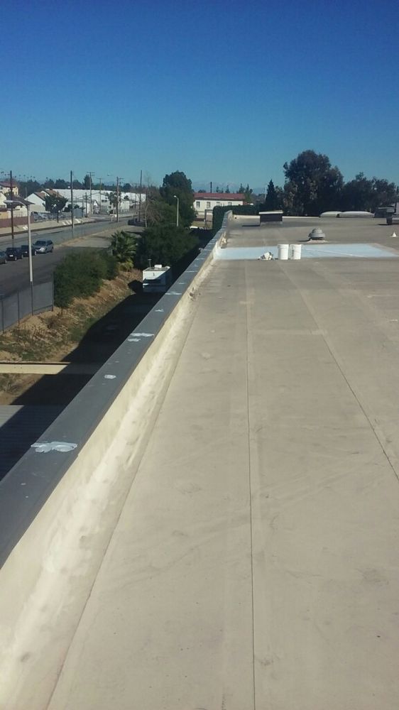 Slide of Competition Roofing