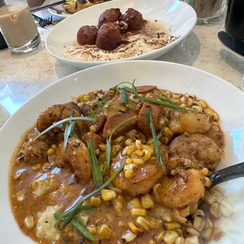 Commons Club - Shrimp and grits, Sweet Potato Drop Donuts, Crème Fraiche Smoked Salmon Omelette - Wine Bars Near Me - New Orleans, Louisiana Commons Club - Shrimp and grits, Sweet Potato Drop Donuts, Crème Fraiche Smoked Salmon Omelette - Wine Bars Near Me - New Orleans, Louisiana