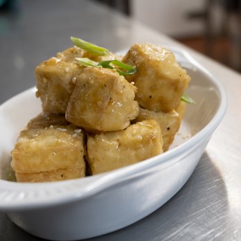 Hotel Ocho Restaurant - Fried Tofu: Szechuan honey, scallions, sesame - Lounges Near Me - Toronto, Ontario Hotel Ocho Restaurant - Fried Tofu: Szechuan honey, scallions, sesame - Lounges Near Me - Toronto, Ontario