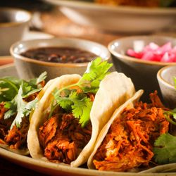 Amate 38 - TACOS OF COCHINITA PIBIL  
Handmade tortillas and pibil style 
pork , served with cured red onion marinated in sour orange juice.