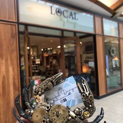 Local By Design - Steampunk crab decor item in front of Local by Design at the Westfield Mall
