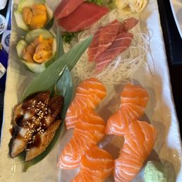 Unagi, salmon sushi, tuna sashimi, uni & o-toro Unagi, salmon sushi, tuna sashimi, uni & o-toro