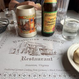 A placemat and one from their fine selection of imported beer A placemat and one from their fine selection of imported beer