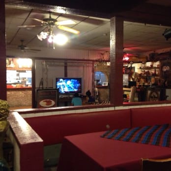 Senor Mr - a red booth with a television in the background - Imported Food Near Me - Inyokern, California