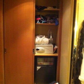 Renaissance Paris Vendome Hotel - Half of the closet filled with a safe and mini-bar. 2 shelves for personal storage. - Hotels Near Me - Paris, 75 Renaissance Paris Vendome Hotel - Half of the closet filled with a safe and mini-bar. 2 shelves for personal storage. - Hotels Near Me - Paris, 75