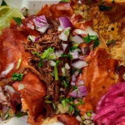Birria Pa La Cruda - 2 tacos, queso tacos in the middle and mulita on the right. Sexy view, awesome taste.