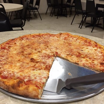 Pizza Al's - a cheese pizza with a slice taken out of it - Pizza Near Me - Canonsburg, Pennsylvania