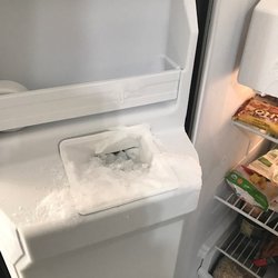 Here's the ice shoot after two days. Completely frozen over because the repair was not done correctly.