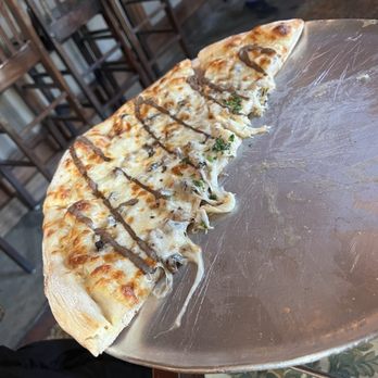 Pirilo - Mushroom pizza (half already eaten) - Italian Near Me - San Juan, Puerto Rico