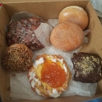 Naa's Bakery - Clockwise: apple fritter, jelly donut, apple donut, german chocolate cake, apricot Danish, pecan cinnamon roll - Bakeries Near Me - Norfolk, Virginia Naa's Bakery - Clockwise: apple fritter, jelly donut, apple donut, german chocolate cake, apricot Danish, pecan cinnamon roll - Bakeries Near Me - Norfolk, Virginia
