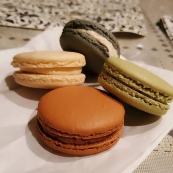 7 Leaves Cafe - Macarons: chocolate (bottom), vanilla (left), pistachio (right), earl grey top) - Coffee & Tea Near Me - Riverside, California 7 Leaves Cafe - Macarons: chocolate (bottom), vanilla (left), pistachio (right), earl grey top) - Coffee & Tea Near Me - Riverside, California