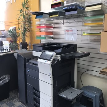 PostNet - One of the copy machines with various colors and types of paper - Shipping Centers Near Me - Galt, California
