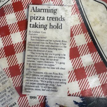 Pizza Rita - These are actual articles laminated on the tables. - Pizza Near Me - Spokane, Washington