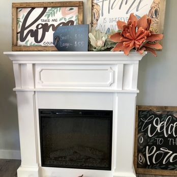 The Olde Bank - a fireplace with a sign and pumpkins - Ice Cream & Frozen Yogurt Near Me - Mt. Summit, Indiana The Olde Bank - a fireplace with a sign and pumpkins - Ice Cream & Frozen Yogurt Near Me - Mt. Summit, Indiana