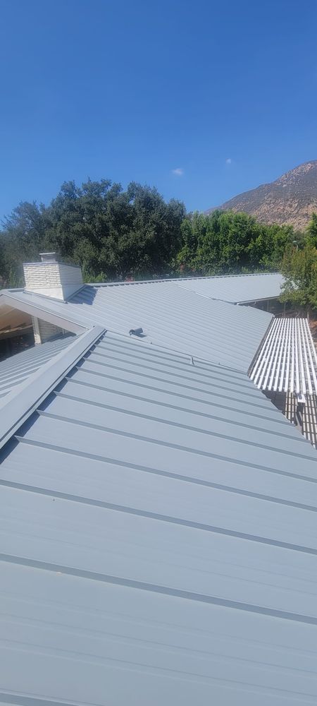 Slide of Tinoco Roofing