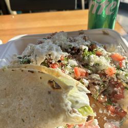 Taqueria Tlaxcali - Nachos and part of a quesadilla.