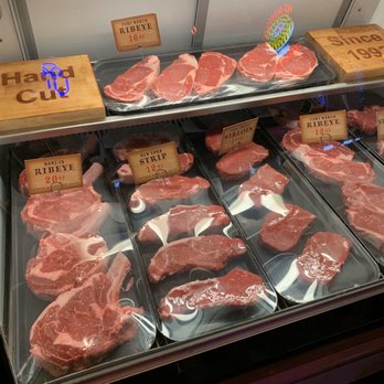 Texas Roadhouse - Variety of steaks on display in a refrigerator. - Steakhouses Near Me - Albuquerque, New Mexico Texas Roadhouse - Variety of steaks on display in a refrigerator. - Steakhouses Near Me - Albuquerque, New Mexico