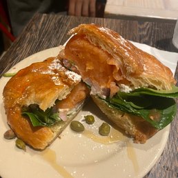 Smoked Salmon Croissant with honey and powdered sugar Smoked Salmon Croissant with honey and powdered sugar