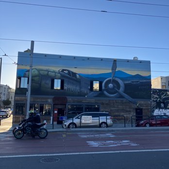 Churchill - an airplane painted on the side of a building - Lounges Near Me - San Francisco, California Churchill - an airplane painted on the side of a building - Lounges Near Me - San Francisco, California