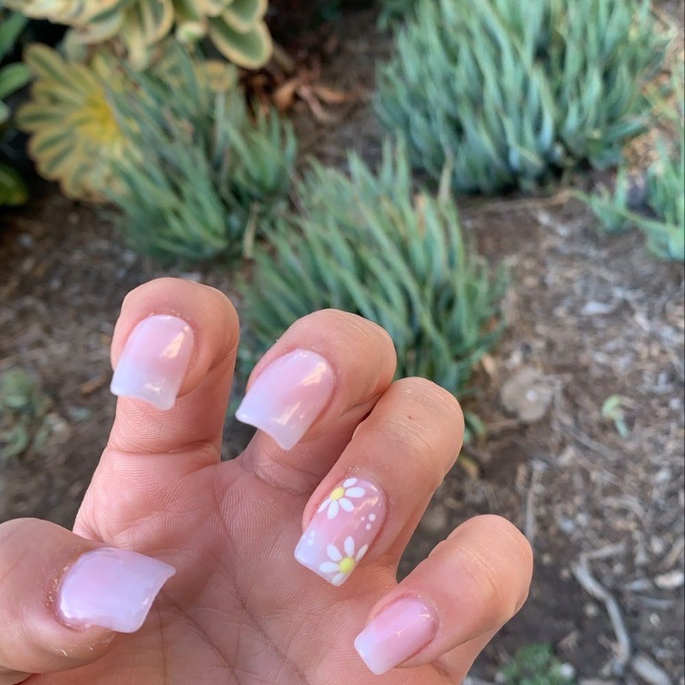 Glamicure - Acrylics nude pink with a subtle flower - Nail Salons Near Me - Los Angeles, California Glamicure - Acrylics nude pink with a subtle flower - Nail Salons Near Me - Los Angeles, California