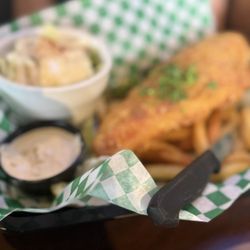 The Rusty Porthole - Fish and chips, 1 big filet. Sorry about the blurring on this one