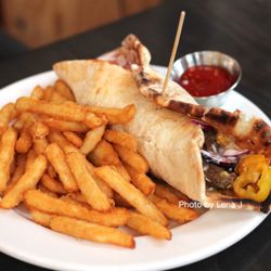 Cilantro on the Lake - Bison Shawarma ($36) - pita bread, banana peppers, pickles, tomatoes, onions, hummus, garlic sauce