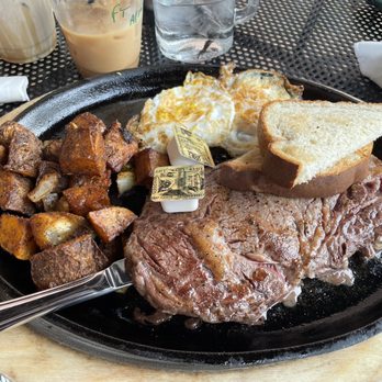 Tipsy Beans Cafe - The hangover platter: ribeye, eggs your way, potatoes, and toast - Bars Near Me - Williamsburg, Virginia