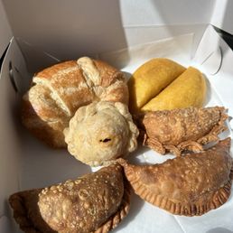 Croissant, breakfast empanada, cheese and spinach empanada Croissant, breakfast empanada, cheese and spinach empanada