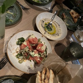 Rumi's Kitchen - Colony Square - Green Tahini Hummus and Watermelon salad - Persian/Iranian Near Me - Atlanta, Georgia Rumi's Kitchen - Colony Square - Green Tahini Hummus and Watermelon salad - Persian/Iranian Near Me - Atlanta, Georgia