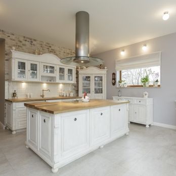 SM Construction - a kitchen with a large island - General Contractors Near Me SM Construction - a kitchen with a large island - General Contractors Near Me