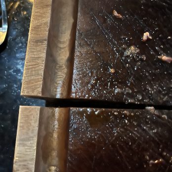 Ritmo Kitchen and Lounge - Crack in cutting board allows juices to leak thru. Beware - Lounges Near Me - Bakersfield, California